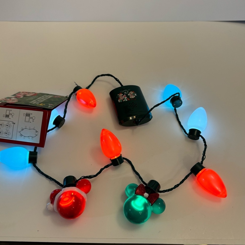 NWT. Disney light up necklace. Light up holiday Christmas necklace lights up